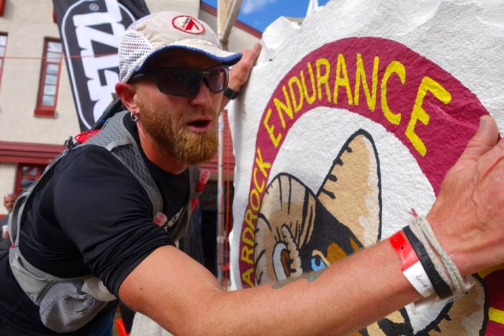 Kissing the rock again. Photo by iRunFar.com